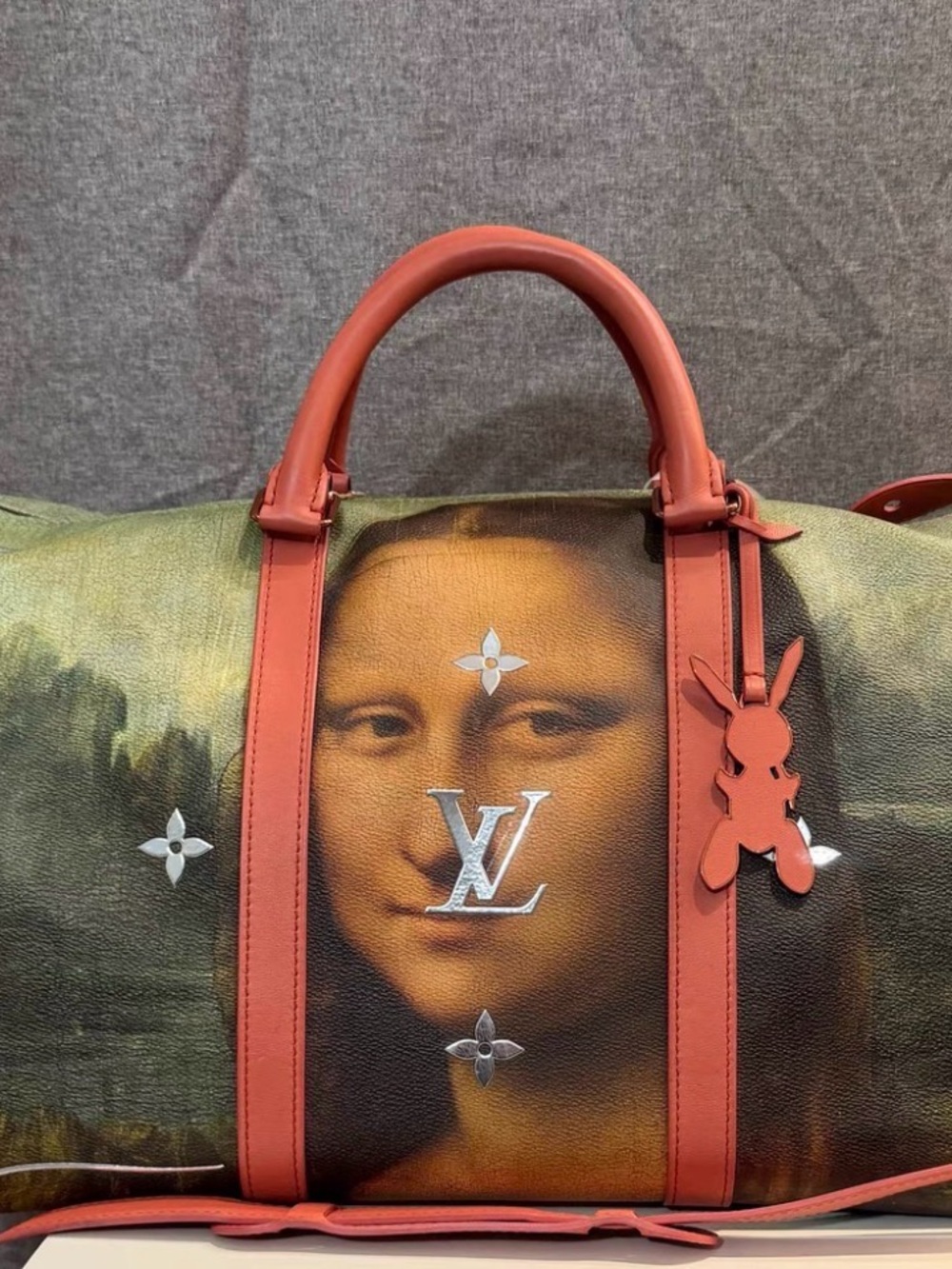 Louis Vuitton 50cm Mona Lisa Canvas Duffle in Brown and Coral